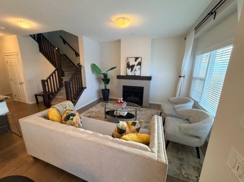 188 Walden Parade Se, Calgary, AB - Indoor Photo Showing Living Room With Fireplace