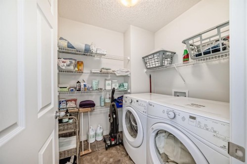 188 Walden Parade Se, Calgary, AB - Indoor Photo Showing Laundry Room