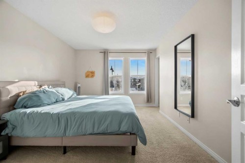 32 Auburn Bay Boulevard Se, Calgary, AB - Indoor Photo Showing Bedroom