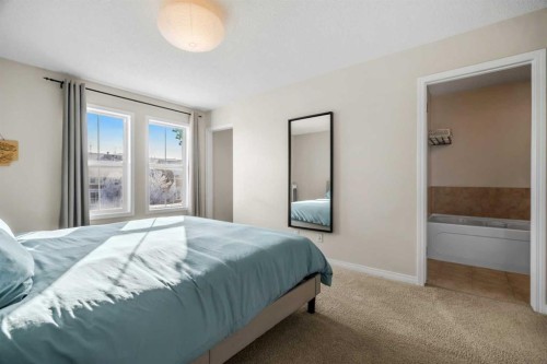 32 Auburn Bay Boulevard Se, Calgary, AB - Indoor Photo Showing Bedroom