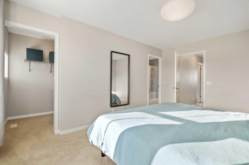 32 Auburn Bay Boulevard Se, Calgary, AB - Indoor Photo Showing Bedroom