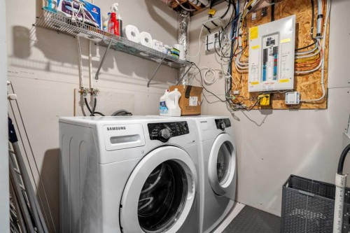 32 Auburn Bay Boulevard Se, Calgary, AB - Indoor Photo Showing Laundry Room