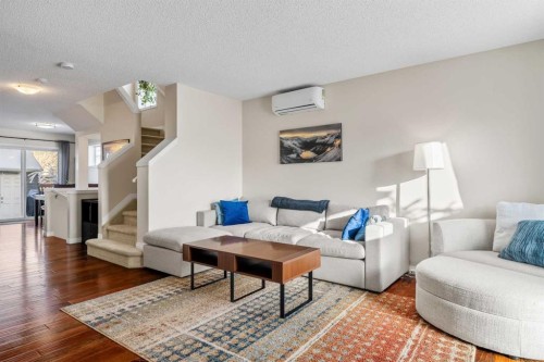 32 Auburn Bay Boulevard Se, Calgary, AB - Indoor Photo Showing Living Room