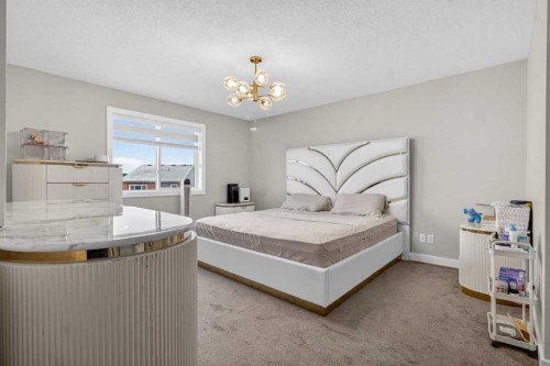 66 Belmont Manor Sw, Calgary, AB - Indoor Photo Showing Bedroom