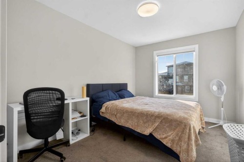 66 Belmont Manor Sw, Calgary, AB - Indoor Photo Showing Bedroom