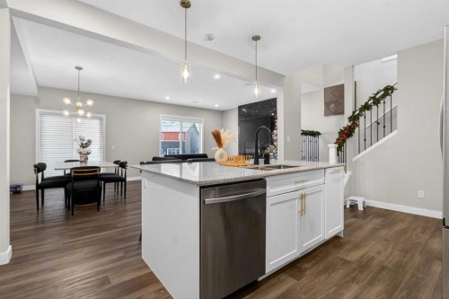 66 Belmont Manor Sw, Calgary, AB - Indoor Photo Showing Kitchen With Double Sink With Upgraded Kitchen