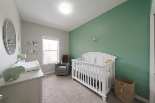 701-250 Fireside View, Cochrane, AB - Indoor Photo Showing Bedroom