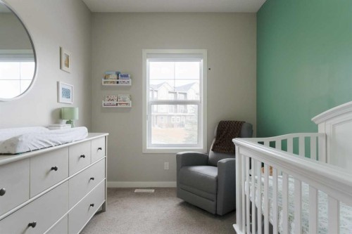 701-250 Fireside View, Cochrane, AB - Indoor Photo Showing Bedroom