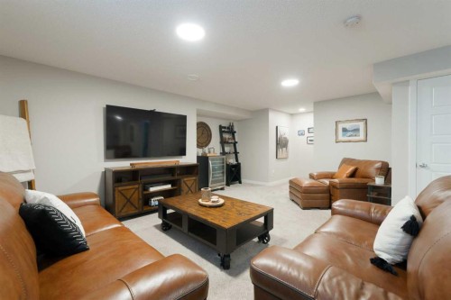 701-250 Fireside View, Cochrane, AB - Indoor Photo Showing Living Room