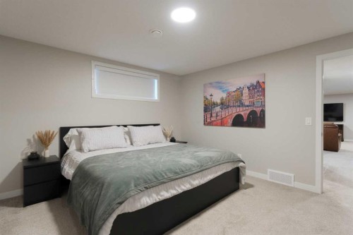 701-250 Fireside View, Cochrane, AB - Indoor Photo Showing Bedroom