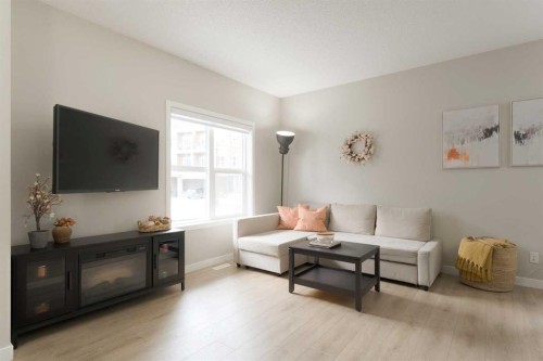 701-250 Fireside View, Cochrane, AB - Indoor Photo Showing Living Room