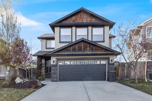 521 Westmount Close, Okotoks, AB - Outdoor With Facade