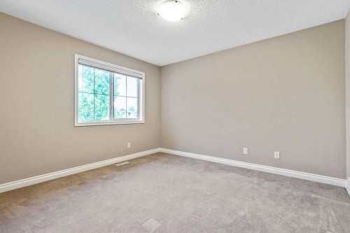 521 Westmount Close, Okotoks, AB - Indoor Photo Showing Other Room