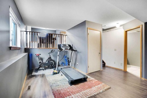 6934 Laguna Way Ne, Calgary, AB - Indoor Photo Showing Gym Room