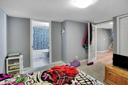 6934 Laguna Way Ne, Calgary, AB - Indoor Photo Showing Bedroom