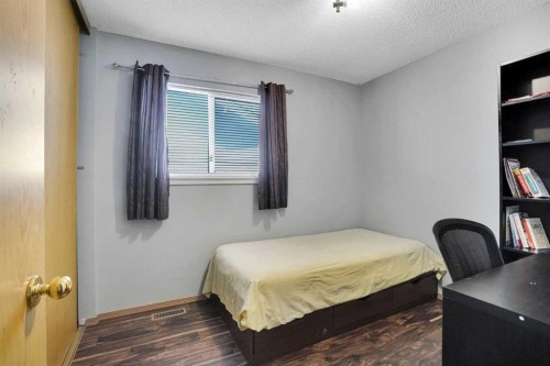 6934 Laguna Way Ne, Calgary, AB - Indoor Photo Showing Bedroom