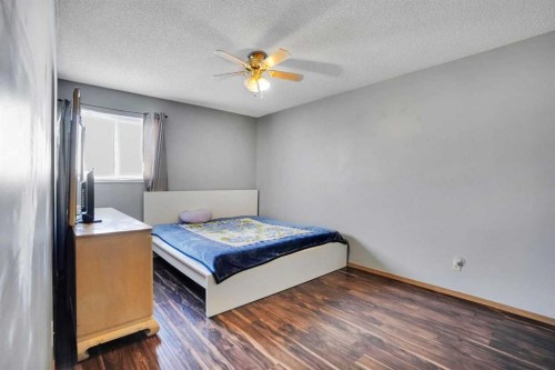 6934 Laguna Way Ne, Calgary, AB - Indoor Photo Showing Bedroom