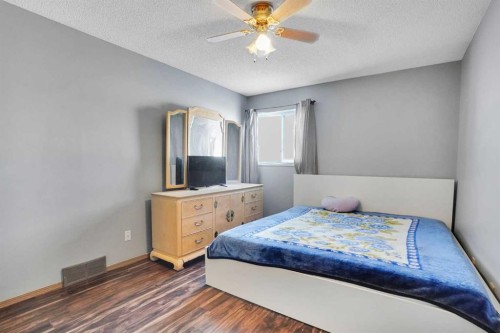 6934 Laguna Way Ne, Calgary, AB - Indoor Photo Showing Bedroom