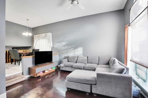 6934 Laguna Way Ne, Calgary, AB - Indoor Photo Showing Living Room