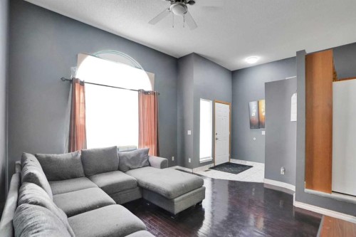 6934 Laguna Way Ne, Calgary, AB - Indoor Photo Showing Living Room