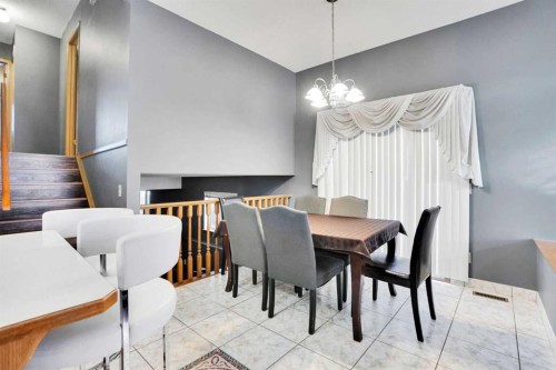 6934 Laguna Way Ne, Calgary, AB - Indoor Photo Showing Dining Room