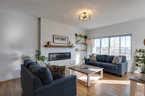 14965 1 Street Nw, Calgary, AB - Indoor Photo Showing Living Room With Fireplace