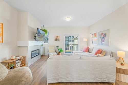 160 Copperleaf Way Se, Calgary, AB - Indoor With Fireplace