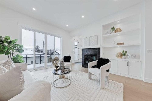 5007 21 Avenue Nw, Calgary, AB - Indoor Photo Showing Living Room With Fireplace