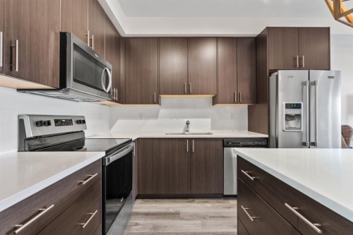 2109-298 Sage Meadows Park Nw, Calgary, AB - Indoor Photo Showing Kitchen With Stainless Steel Kitchen With Upgraded Kitchen