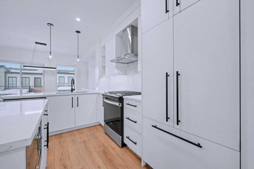 254-7820 Spring Willow Drive Sw, Calgary, AB - Indoor Photo Showing Kitchen With Upgraded Kitchen