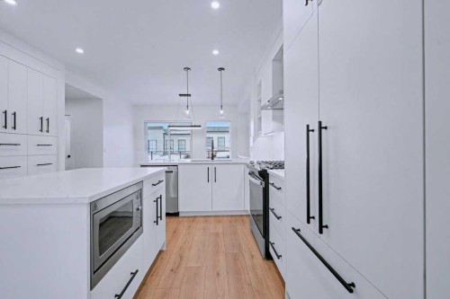 254-7820 Spring Willow Drive Sw, Calgary, AB - Indoor Photo Showing Kitchen