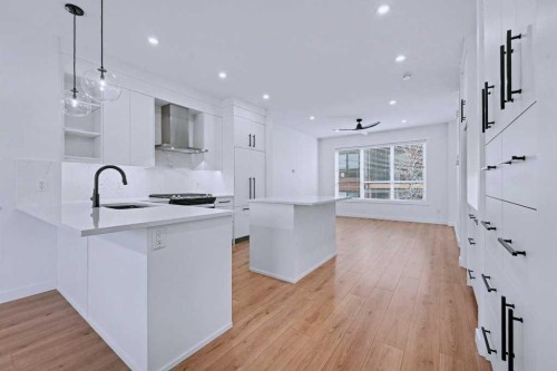 254-7820 Spring Willow Drive Sw, Calgary, AB - Indoor Photo Showing Kitchen With Upgraded Kitchen