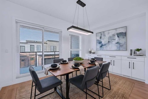 254-7820 Spring Willow Drive Sw, Calgary, AB - Indoor Photo Showing Dining Room
