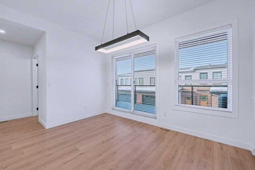 254-7820 Spring Willow Drive Sw, Calgary, AB - Indoor Photo Showing Other Room