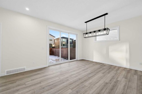 29 Rowmont Common Nw, Calgary, AB - Indoor Photo Showing Other Room