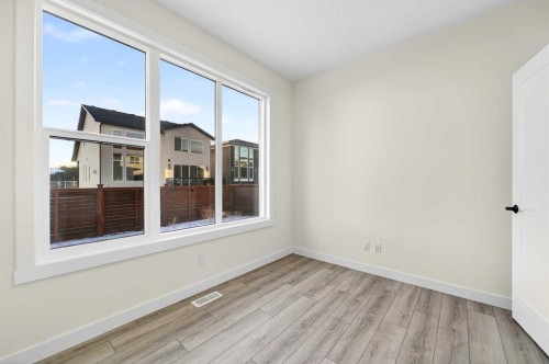 29 Rowmont Common Nw, Calgary, AB - Indoor Photo Showing Other Room