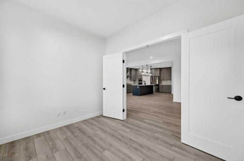 29 Rowmont Common Nw, Calgary, AB - Indoor Photo Showing Other Room