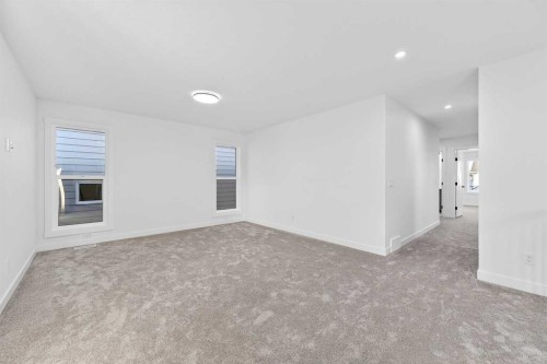 29 Rowmont Common Nw, Calgary, AB - Indoor Photo Showing Other Room