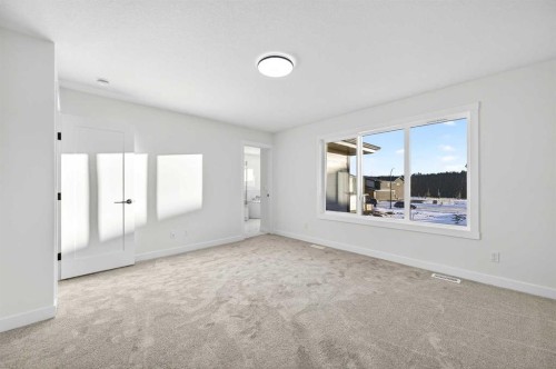 29 Rowmont Common Nw, Calgary, AB - Indoor Photo Showing Other Room