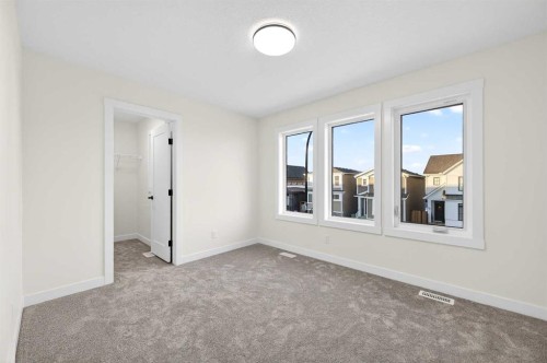 29 Rowmont Common Nw, Calgary, AB - Indoor Photo Showing Other Room