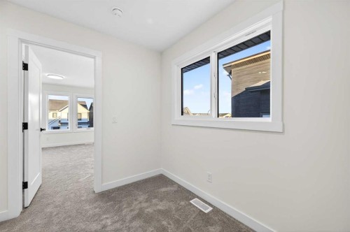 29 Rowmont Common Nw, Calgary, AB - Indoor Photo Showing Other Room