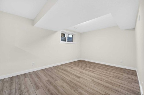 29 Rowmont Common Nw, Calgary, AB - Indoor Photo Showing Other Room