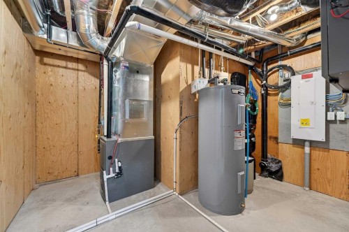 29 Rowmont Common Nw, Calgary, AB - Indoor Photo Showing Basement