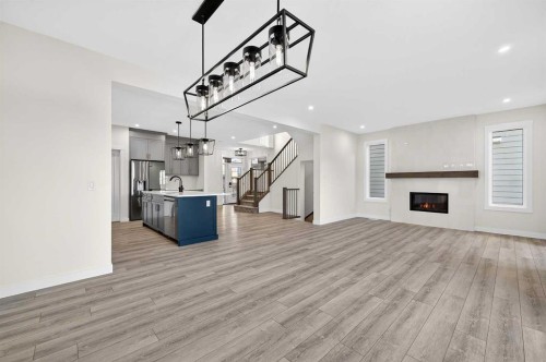 29 Rowmont Common Nw, Calgary, AB - Indoor With Fireplace