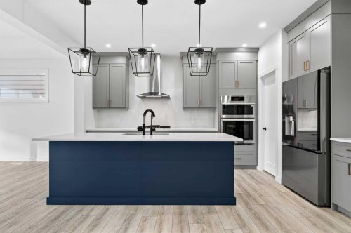 29 Rowmont Common Nw, Calgary, AB - Indoor Photo Showing Kitchen With Upgraded Kitchen