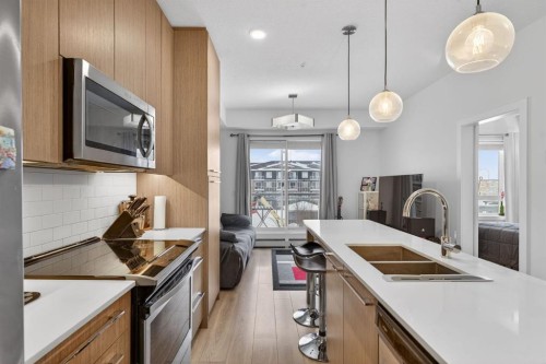 2311-76 Cornerstone Passage Ne, Calgary, AB - Indoor Photo Showing Kitchen With Double Sink With Upgraded Kitchen