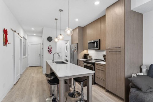 2311-76 Cornerstone Passage Ne, Calgary, AB - Indoor Photo Showing Kitchen With Double Sink With Upgraded Kitchen