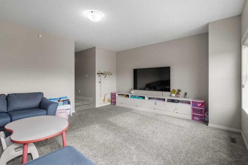 175 Howse Rise Ne, Calgary, AB - Indoor Photo Showing Living Room