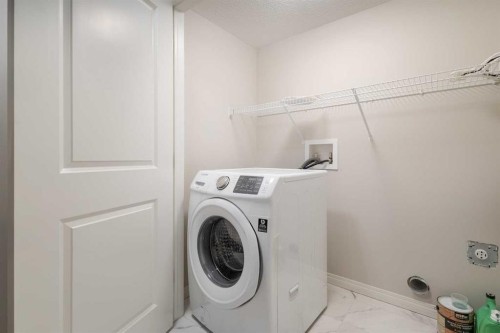175 Howse Rise Ne, Calgary, AB - Indoor Photo Showing Laundry Room
