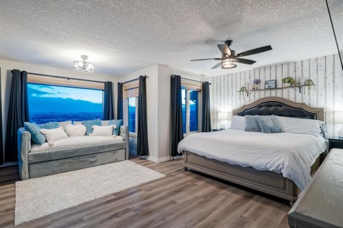 203 Sunset Circle, Cochrane, AB - Indoor Photo Showing Bedroom